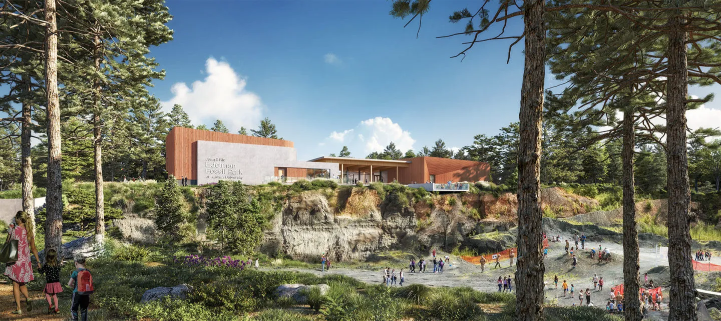 The museum seen from the quarry overlook, its timber volume above the dig site